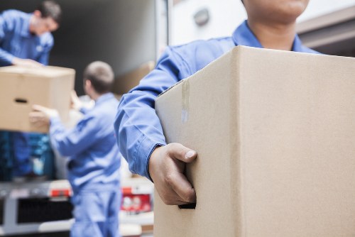 Office removals team preparing business furniture in Kingsbury