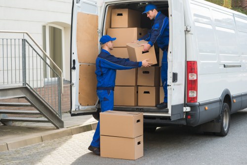 Local moving van helping with furniture transport in Kingsbury