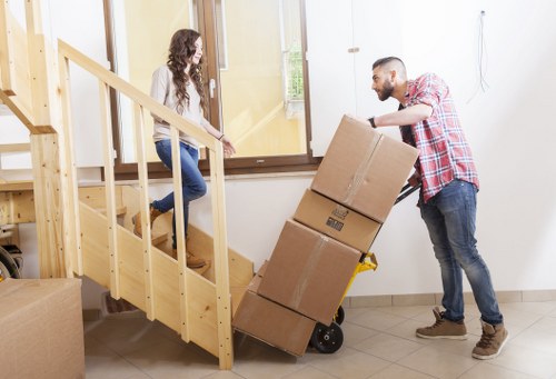 A professional team handling office furniture and equipment during a Kingsbury relocation
