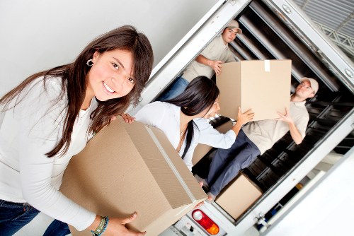 Business relocation team unloading items at a Kingsbury premises