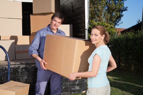 Packed moving boxes ready for urgent removals in Kingsbury
